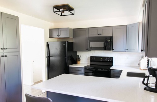 Spokane Valley House | 9 beds! Sleeps 16! 6 bedrooms, 4 bathrooms, 2 kitchens… rent a whole duplex!