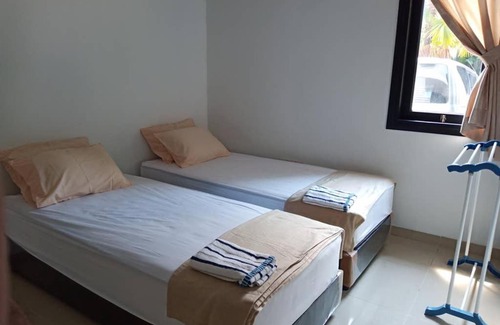 Lubuk Baja House | Convenient 4BR Retreat Near NagoyaHill - Family-Friendly Stay