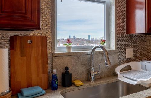 Dorchester Apartment | Discover 90-Boston: Convenient Apartment for Families & Pets