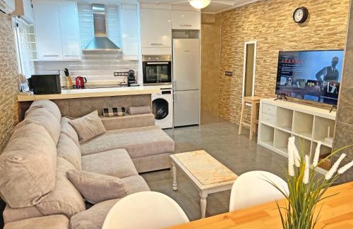 Santa Pola Apartment | Discover Beachfront Bliss: Free Parking & Ocean Views