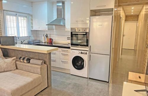 Santa Pola Apartment | Discover Beachfront Bliss: Free Parking & Ocean Views