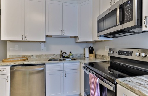 Boardwalk House | Pet-Friendly Beachside Home with Pool Steps from Flagler Ave