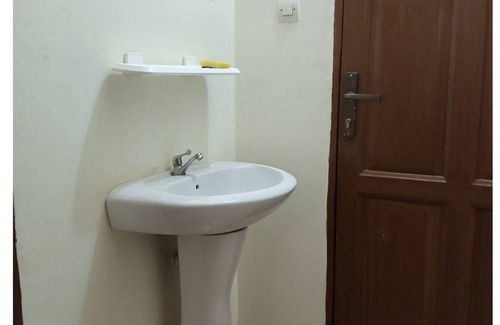 Lome Apartment | Modern 2-Bedroom Apartment Near Airport with Great Amenities