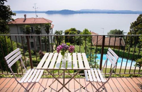 Belgirate Apartment | Scenic Retreat: A Balcony on Lake Maggiore with Pool Access