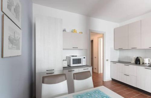 Belgirate Apartment | Scenic Retreat: A Balcony on Lake Maggiore with Pool Access