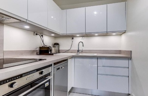 7th Arrondissement Apartment | Elegant Eiffel Home with Balcony Overlooking Esplanade des Invalides