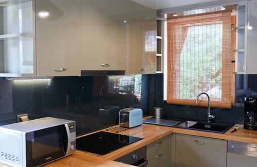 Arkadiko Chorio Apartment | Enchanting Apartment by the Sea with Pool & Ocean Views