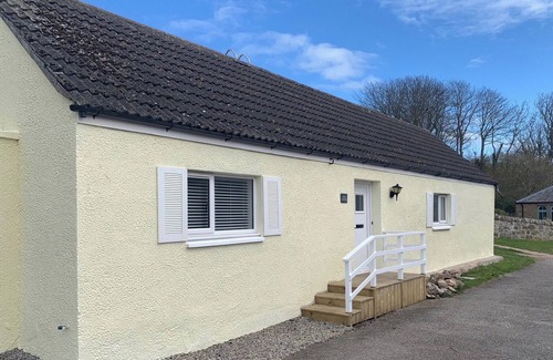 Portmahomack Cottage | Charming Coastal Cottage with Ocean Views in Portmahomack