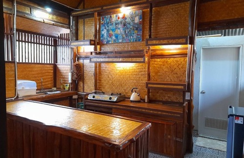 Huai Sai House | Inviting Bungalow with Kitchen in Serene Countryside