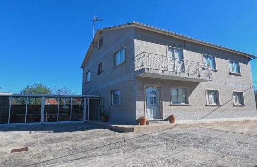 A Lanzada House | Experience A Casa do Lareiro: Oceanfront Bliss Awaits