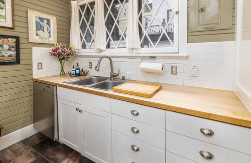 Portage Bay Cottage | Quaint City Cottage with Spa and Backyard Chickens Awaits
