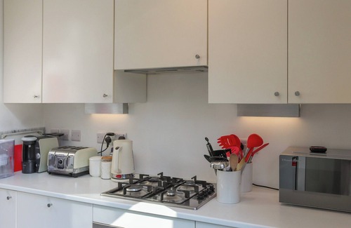 Newtown Cottage | A charming townhouse in the heart of Newtown, set on a lovely street.