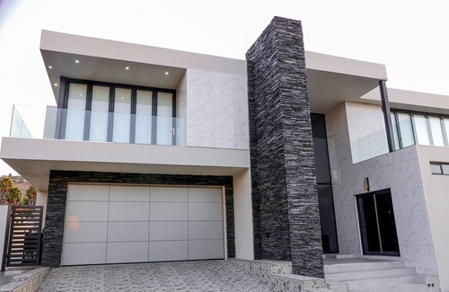 Greater Johannesburg Metropolitan Area Villa | Bright Contemporary Retreat with Private Pool and Family Perks