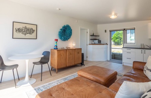 Pohara Cabin | Bright Beachside Cabin with Ocean View Steps from the Shore