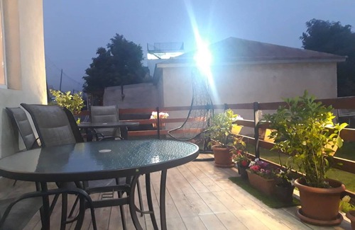 Stepantsminda House | Idyllic House with Veranda and Scenic Kazbegi Views