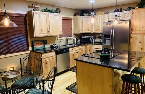 Comins Cabin | Serene Creekside Cabin: Perfect for Nature Lovers with Spa