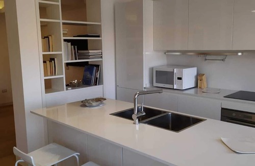 Poetto House | Modern Apartment Steps from the Beach with Ocean Views