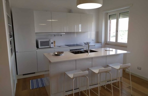 Poetto House | Modern Apartment Steps from the Beach with Ocean Views