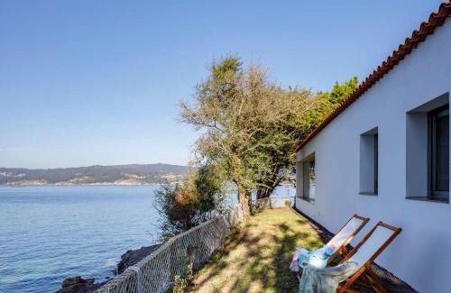 Donon House | Beachfront Retreat at A Factoria Beach House by Prishomes