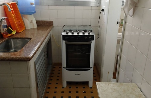 Pitangueiras Apartment | Steps from Praia das Pitangueiras, Rated 9.6/10 with Ocean View