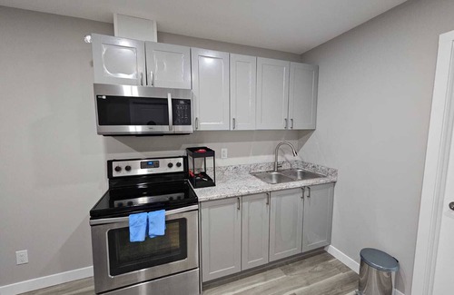 Regina House | A Fully furnished basement suite with separate entrance.