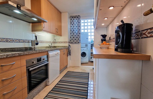 San Luis de Sabinillas Apartment | Tranquil Penthouse with Ocean View, Steps from the Beach