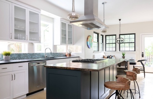 Riverside House | A Hidden Retreat: Your Downtown Entertainer's Paradise