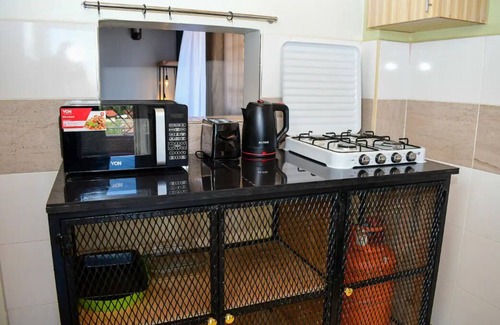 Nyeri Apartment | Rustic Chic Escape at A+I Skyview for Family Getaways