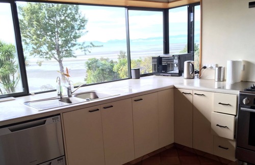 Kaiteriteri House | Exceptional Beachfront Playground with Ocean Views & Family Amenities