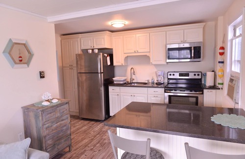 Ship Bottom Condo | Discover a Slice of Heaven: Pet-Friendly Retreat Awaits