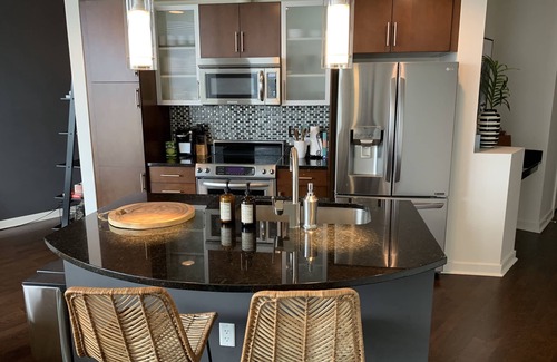Downtown Denver House | Elegant Home in Denver’s Premier High Rise with Spa & Pool