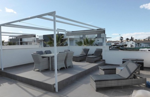 Quesada Villa | Modern Villa with Lake View, Pool & Garden Oasis