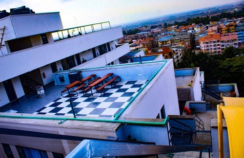 Nairobi Apartment | Modern Studio with Terraces and Pool for Scenic Views