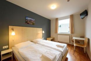 Hohenschoenhausen Hotel | Pet-Friendly a&o Berlin Kolumbus with Pool & Dining Options