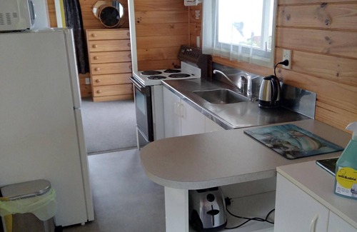 Whareroa Village House | Tranquil Retreat by Lake Taupo with Pool and Ocean View