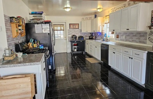 Grandy House | Tranquil River Escape: Hot Tub, Family-Friendly, Pet Welcome!