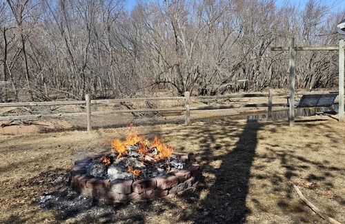 Grandy House | Tranquil River Escape: Hot Tub, Family-Friendly, Pet Welcome!