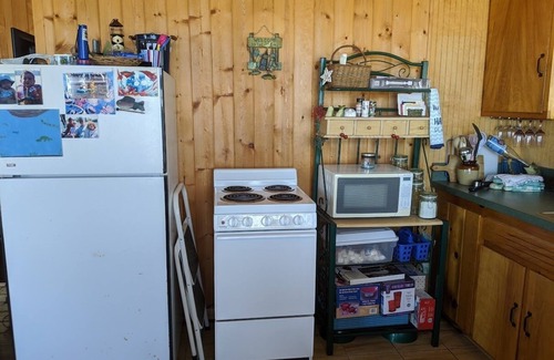 Kalkaska Cottage | Idyllic Lakefront Cottage with Ocean View and Family Amenities