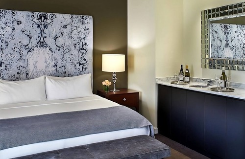 West Plaza Hotel | Enjoy a Pet-Friendly Getaway with Pool Access!