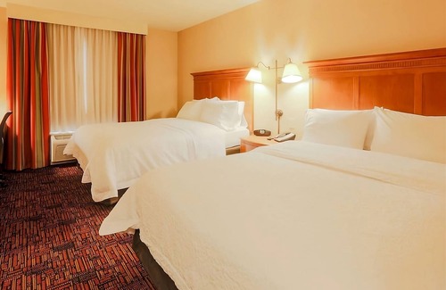 Tomball Hotel | Discover Comfort with Poolside Units and Free Breakfast!