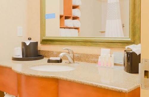 Tomball Hotel | Discover Comfort with Poolside Units and Free Breakfast!