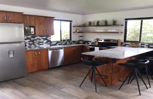 Escobal House | Discover a Serene Paradise with Pool and Family Amenities