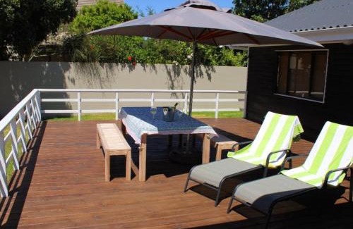 Still Bay House | Charming Riverfront Escape: A Rickety River House Awaits