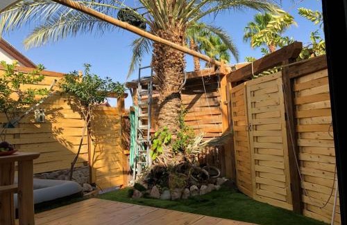 Eilat Apartment | Serene Oasis: Guest Rated 9.8 with Hot Tub & Family Fun