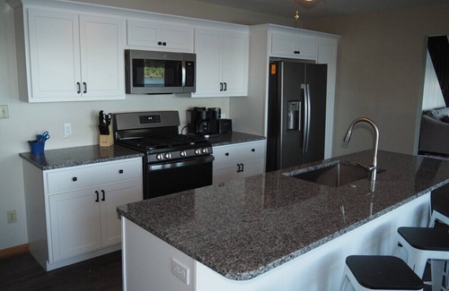 Elk Rapids Cottage | Experience Sandy Lakefront Bliss with Spa and Kayaks