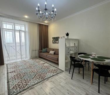 Karagandy Apartment | Guest Rated: A-Six Apartment with Pool & Child-Friendly Amenities