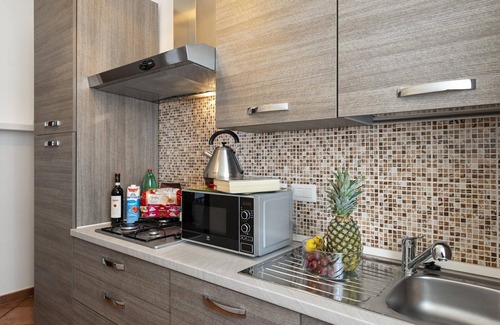 Sallustiano House | Bright Apartment with Kitchen & Family-Friendly Amenities