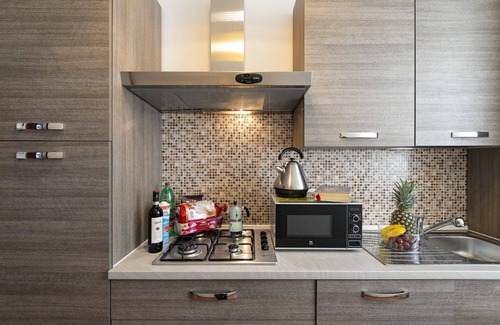 Sallustiano House | Bright Apartment with Kitchen & Family-Friendly Amenities