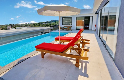 Patara Villa | A stunning contemporary villa with views towards the sea at Patara.