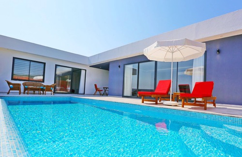 Patara Villa | A stunning contemporary villa with views towards the sea at Patara.